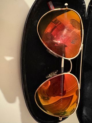 Gafas de sol Polaroid naranjas y doradas