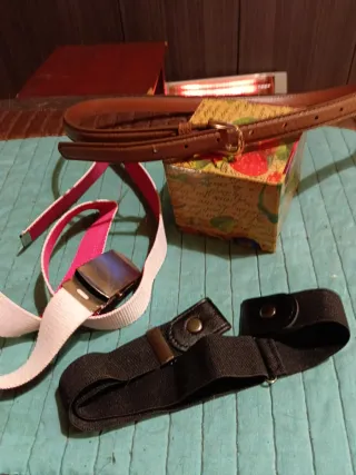 Lote 3 cinturones: rosa, marrón y negro