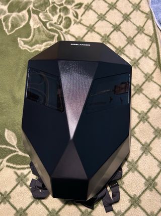 Crelander Mochila para motocicleta con ojos rojos