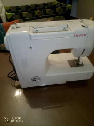 Máquina de coser con puntada variable