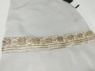 Top fiesta cintura dorada con lazada.