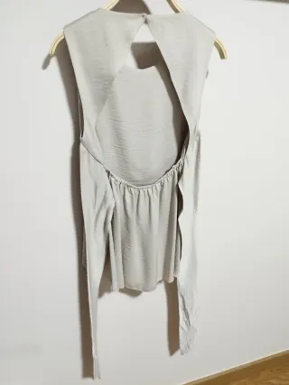 Top fiesta cintura dorada con lazada.