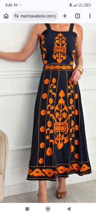 Conjunto negro y naranja bordado