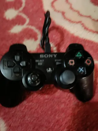 Consola PS3 Slim de 250 GB,Negra + Mando y Cables.