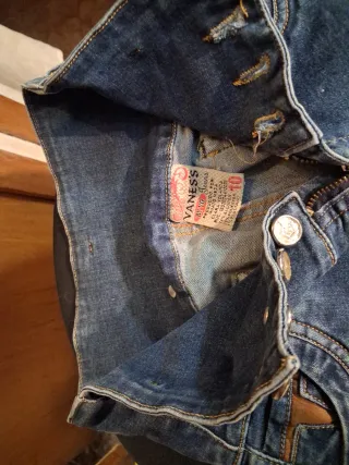 2 pantalones uno tejano elásticos.34y negro poli.M