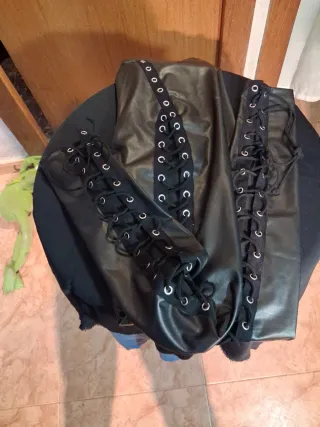 2 pantalones uno tejano elásticos.34y negro poli.M