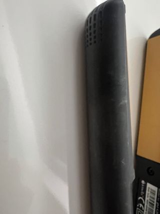 Plancha de pelo GHD negra y amarilla