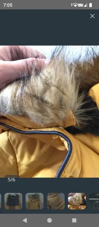 Abrigo amarillo con capucha y pelo