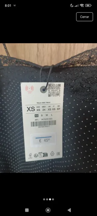 Top asimétrico lunares negro