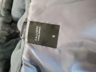 Giacca in ecopelliccia Calliope con cappuccio S