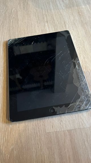 Apple iPad 2 Plata 16GB para piezas o reparar