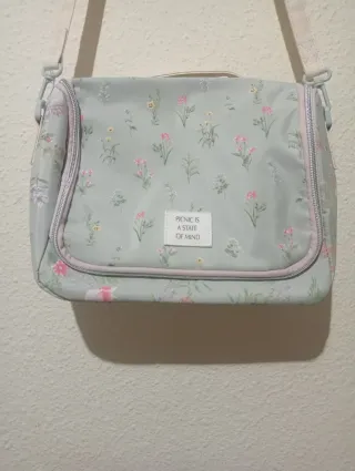 Bolso nevera bandolera y mano floral