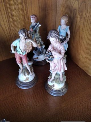 Figuras porcelana antiguas niños, 30€ cada una