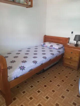 Dormitorio Rústico en madera natural.