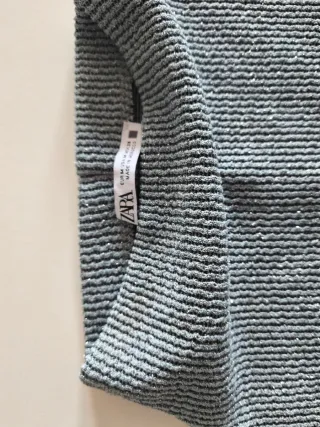 Jersey de punto azul y gris