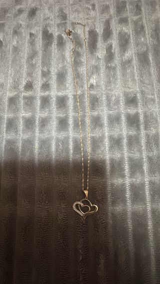 Colgante oro dos corazones con circonitas