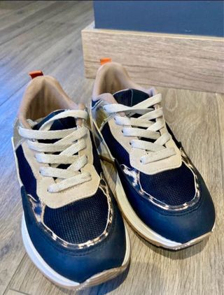 Zapatillas deportivas leopardo y dorado