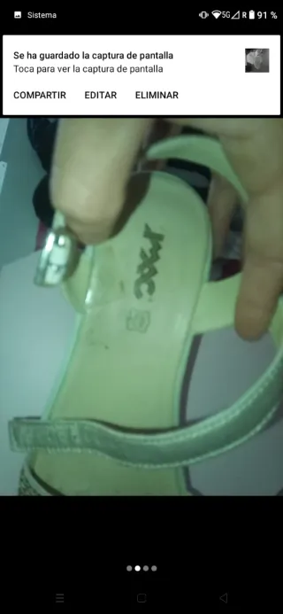 Sandalia de piel blanca y dorada de piel