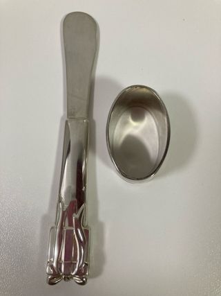 Pala mantequilla y servilletero plata