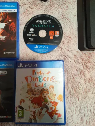 PS4 (PlayStation 4) Negra + 8 Juegos + 2 Mandos