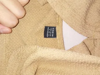 Traje de verano beige drapeado