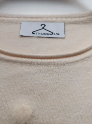 Jersey mujer blanco con pompones.