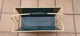 Revistero antiguo metal con foto