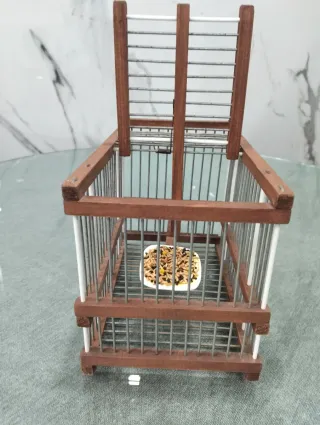 Jaula para pájaros de madera y metal