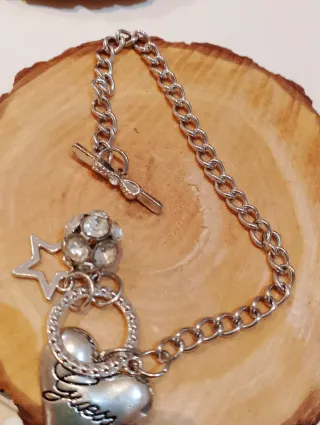 Pulsera Guess Corazón y Estrella