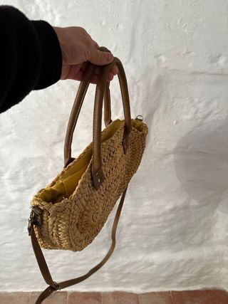 Bolso redondo de paja y cuero