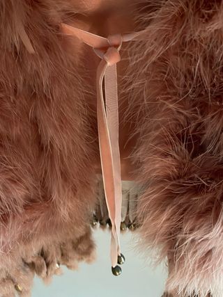 Chaleco de plumas malva talla única. Como nuevo