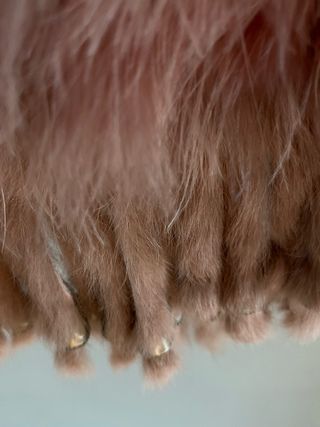 Chaleco de plumas malva talla única. Como nuevo