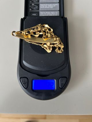 Pulsera de oro con placa