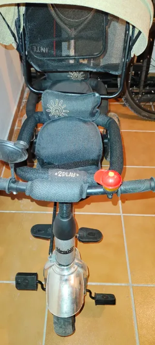 Triciclo doble para bebés