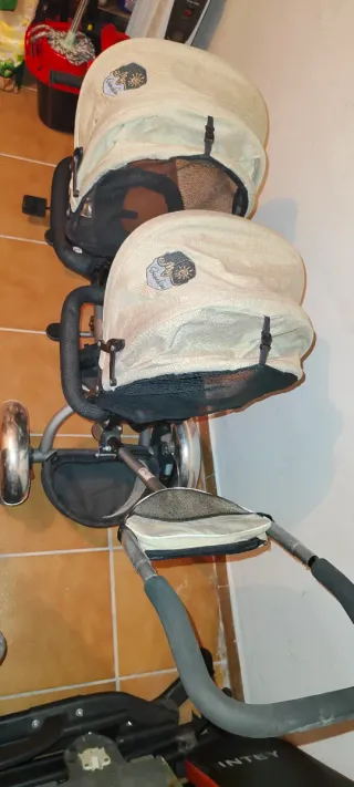 Triciclo doble para bebés