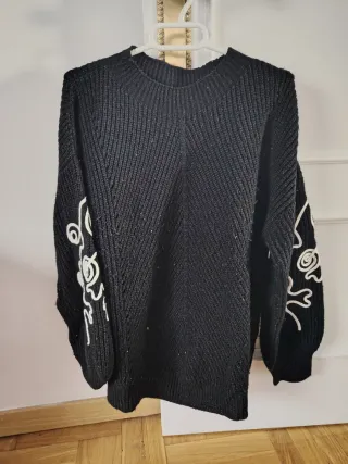 Jersey lana negro con detalles blancos
