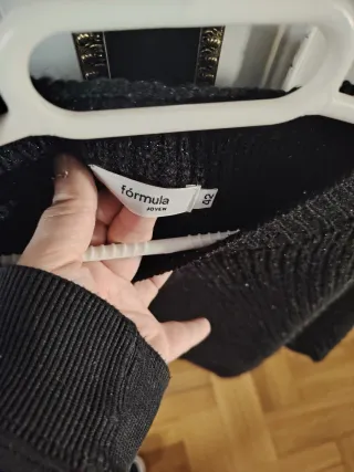 Jersey lana negro con detalles blancos