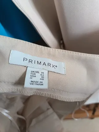 Traje de mujer beige y azul