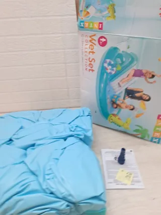 Piscina hinchable Intex con tobogán y aspersor