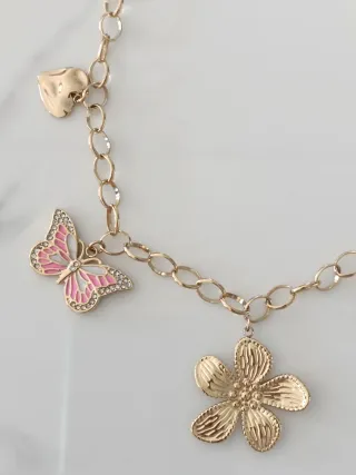 Collar Aleteo de Vida. Acero inoxidable dorado.