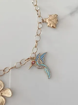 Collar Aleteo de Vida. Acero inoxidable dorado.