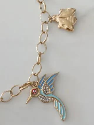 Collar Aleteo de Vida. Acero inoxidable dorado.