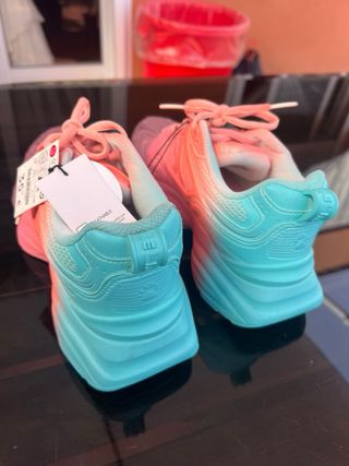 Zapatillas deportivas degradado rosa y naranja