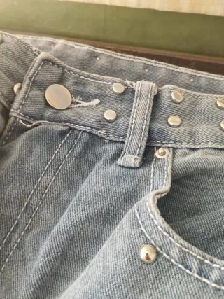 Pantalones anchos mujer con tachuelas