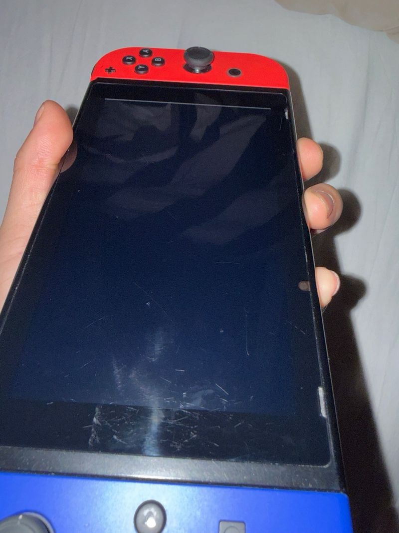 Nintendo Switch V2 + 2 Juegos + SD 128GB afbeelding 6
