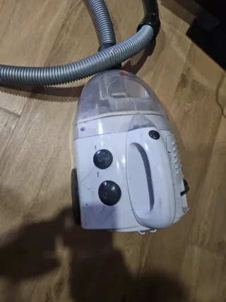 Aspiradora portátil con manguera