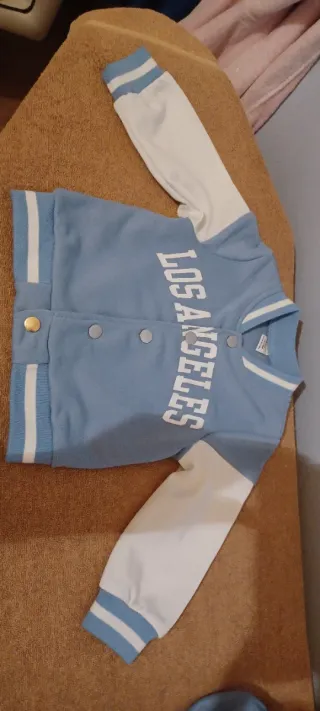 Conjunto niña chaqueta y falda azul