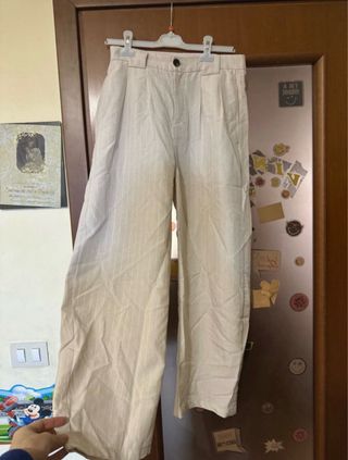 Pantaloni beige eleganti gessati stile baggy