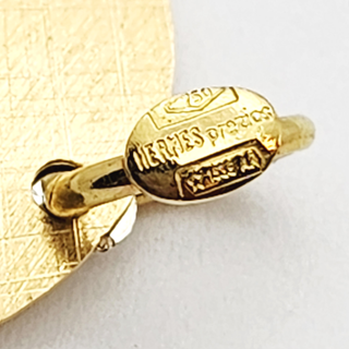 Colgante Hermes Oro amarillo y blanco de 18k