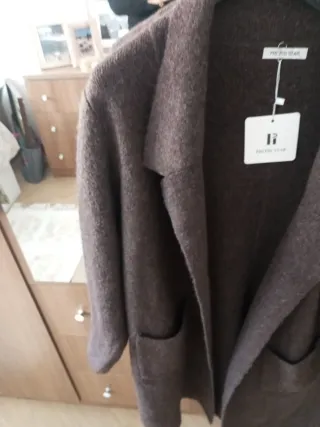 Chaqueta larga marrón con bolsillos Me costó 67. N